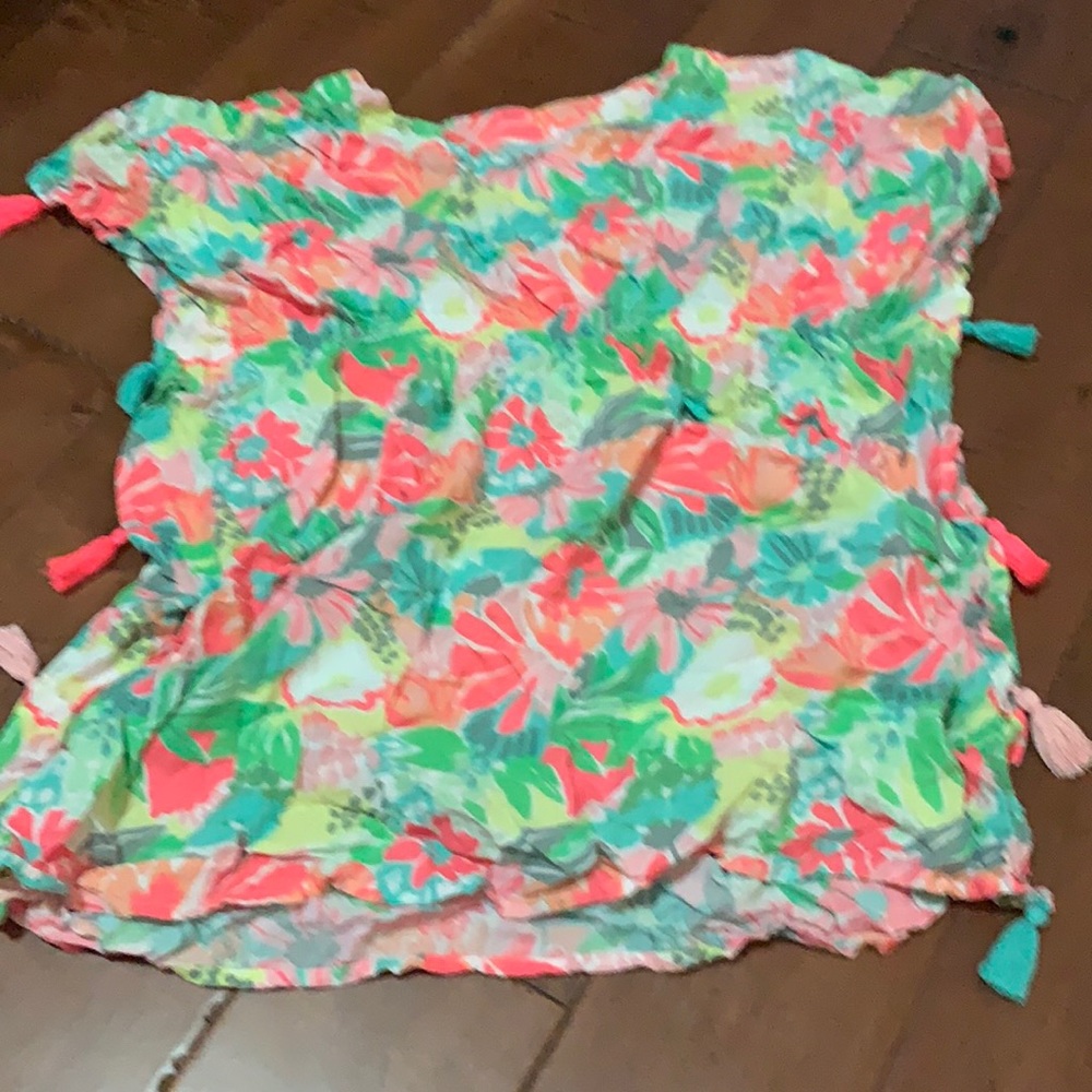Multi colored cover up with little tassels